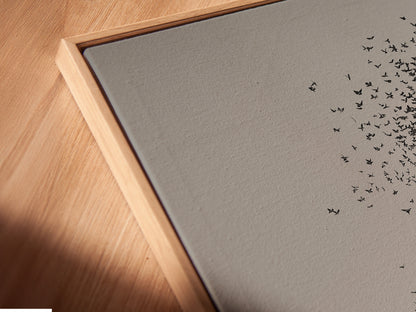 A close-up of a canvas print in a floating frame. The art appears to float within the frame. This creates a modern and stylish look. The floating frame enhances the artwork's visual impact. It's a unique way to display your favorite pieces. Discover the beauty of floating frames.
