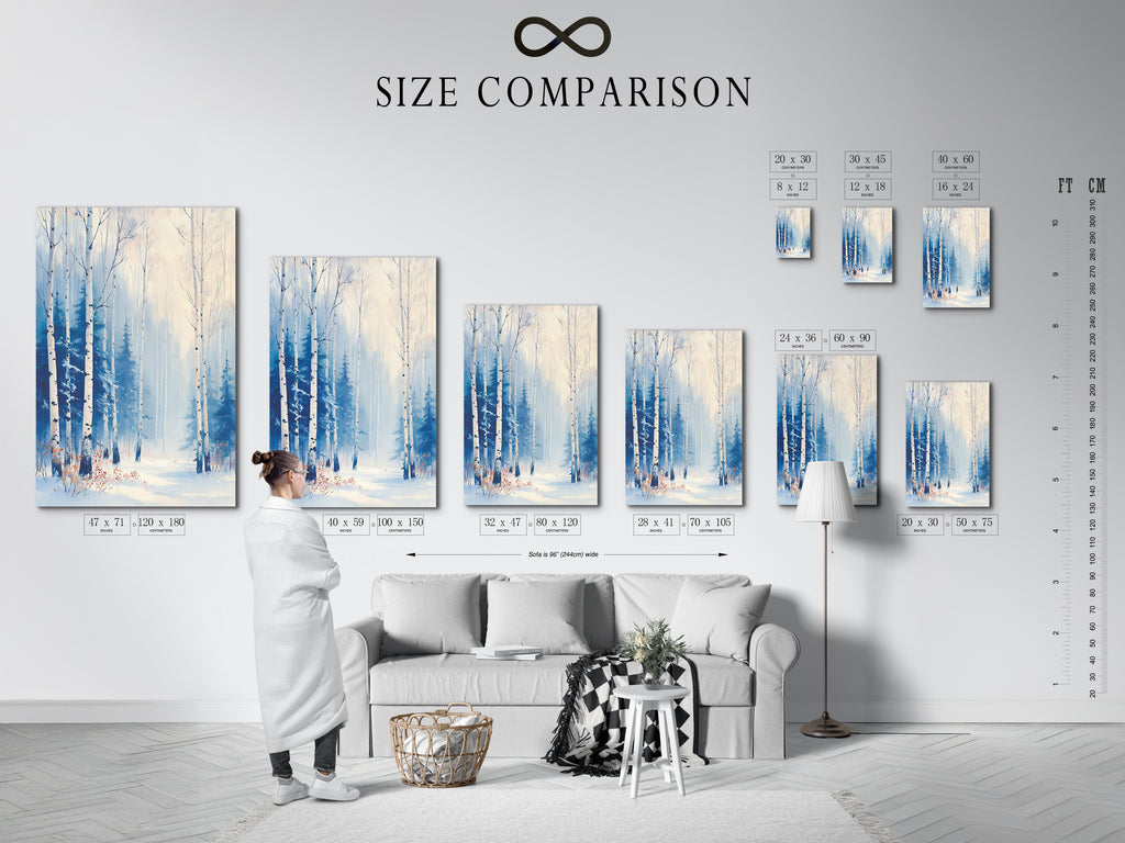 A size comparison chart in an interior shows the Winter Forest canvas print. This blue and white art complements minimalist and Scandinavian styles. Perfect for living rooms bedrooms offices studios lobbies and waiting rooms. Available as a stretched canvas print a fine art poster or in a floating frame.