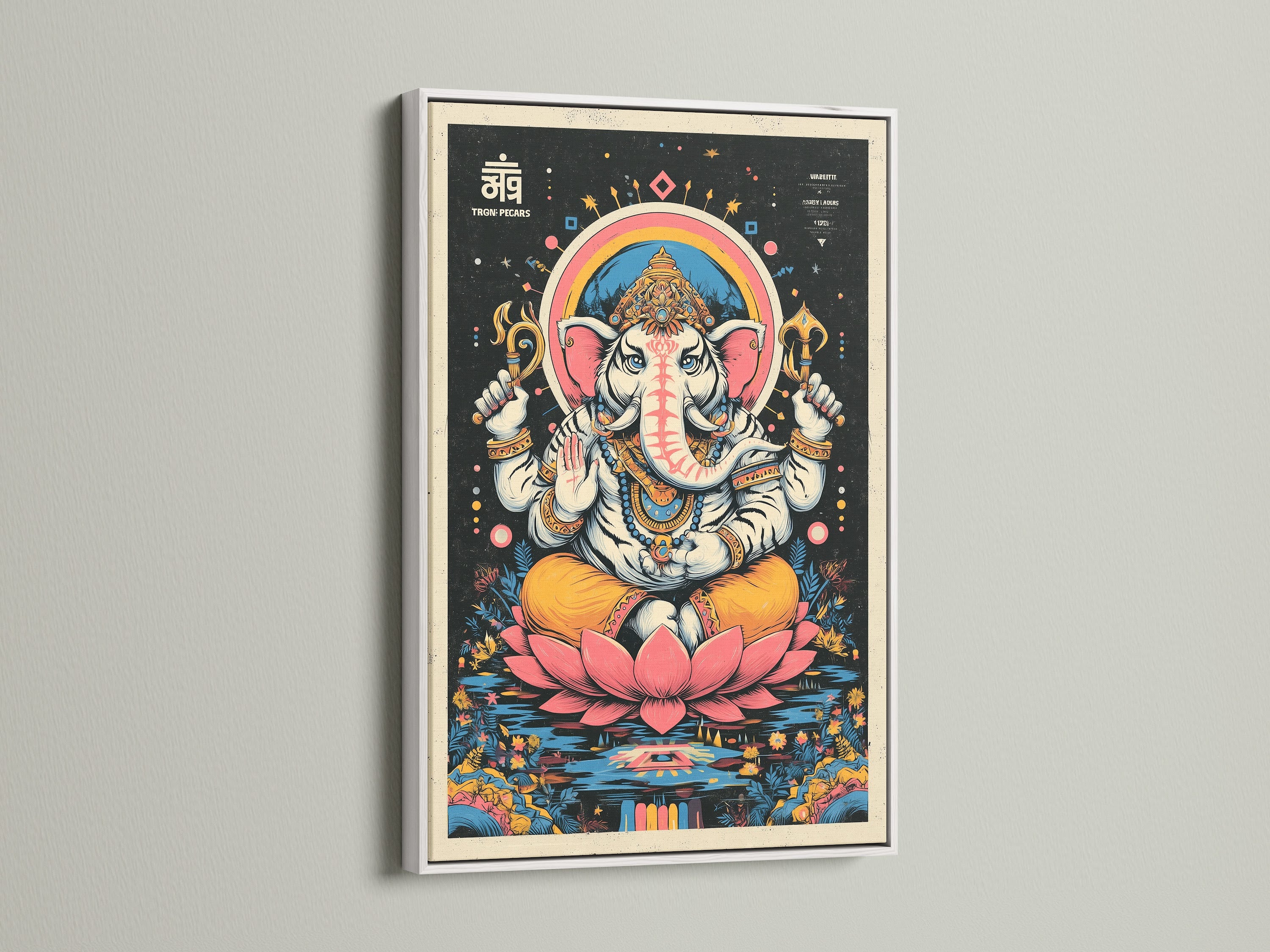 Ganesha Canvas art in a white frame. This Hindu God art brings spiritual decor to your home. The meditation art is perfect for a yoga studio. The elephant deity artwork is a unique piece. This Ganesha lotus art print is vibrant.