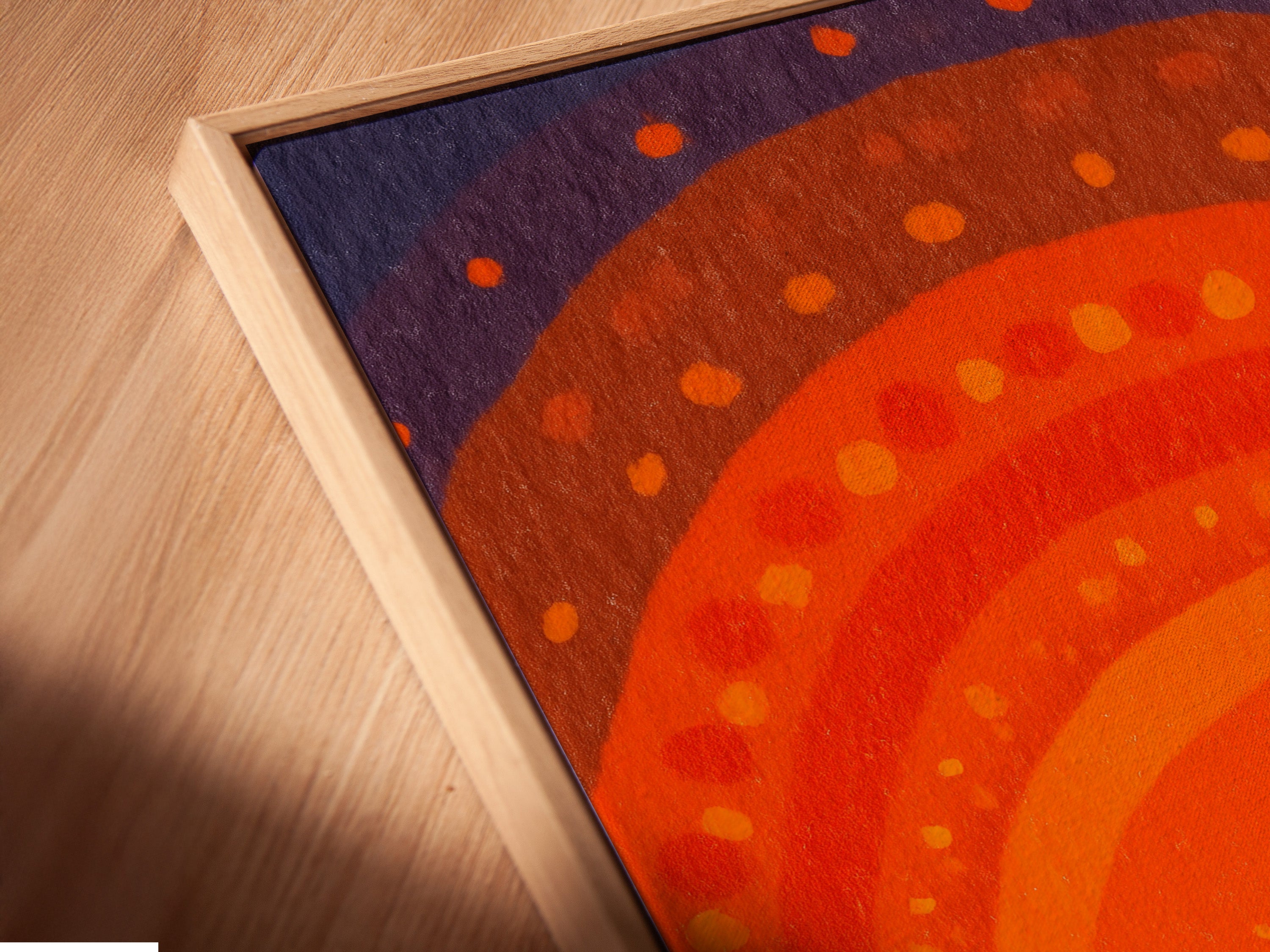 A close-up angled view of the Sunset Boats canvas print in a floating frame. The frame enhances the artwork's depth and dimension. Perfect for those seeking modern home decor with a mid-century modern touch. The ocean art print is ready to hang.