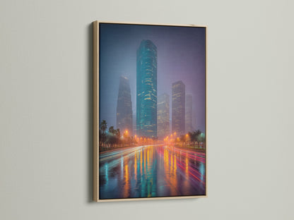Discover a cityscape canvas art print showcased in an oak frame. This urban wall artwork brings a modern touch. The teal city print captures a stunning skyline. It's ideal for living rooms and offices. Enjoy the vibrant city lights art.