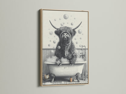 This image displays a framed highland cow art print. The frame is made of oak. This funny animal art brings a rustic touch. Ideal as a cow in tub print for unique wall art. It enhances any farmhouse decor.