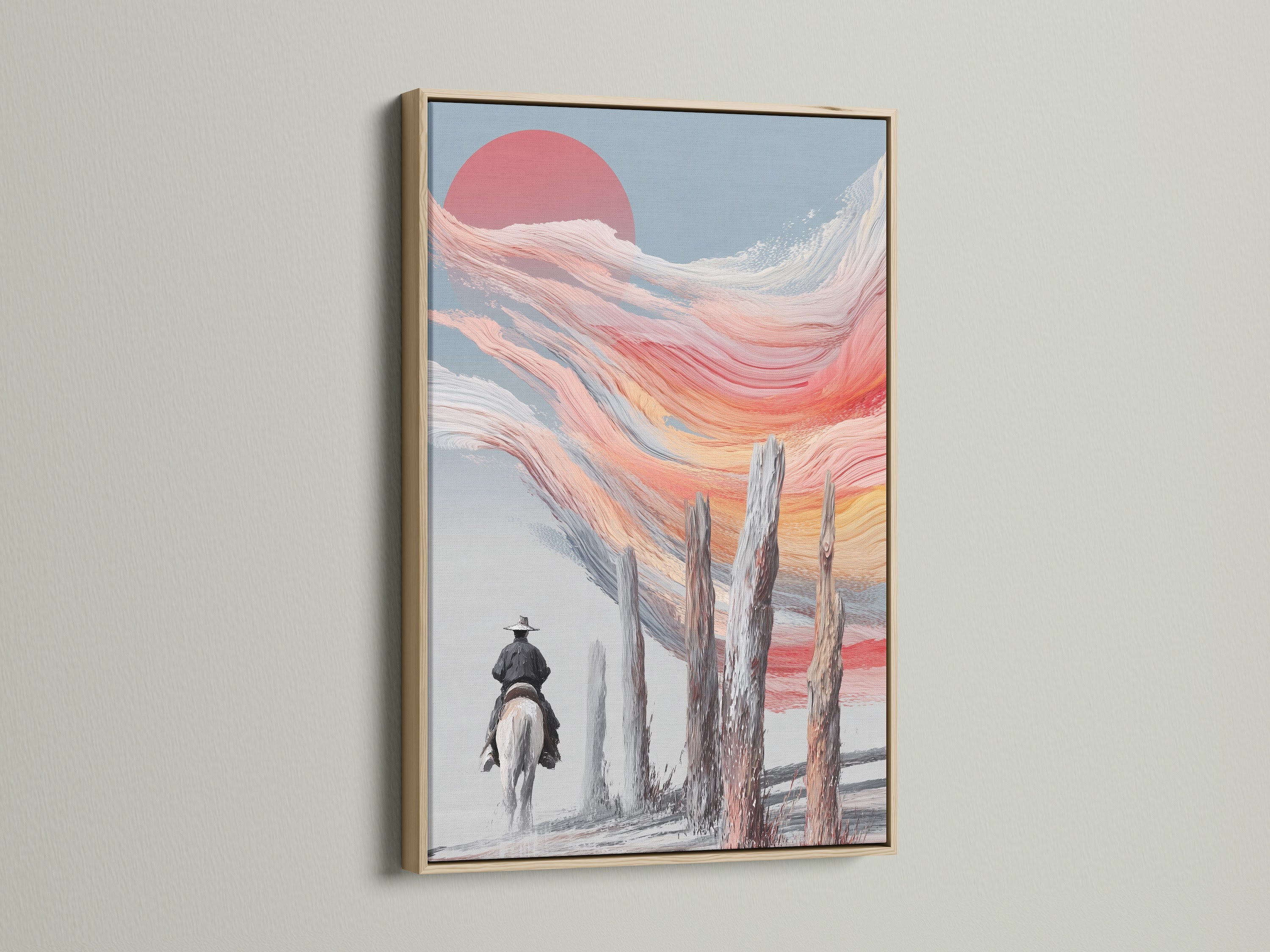 Cowboy sunset artwork framed in oak. This western landscape wall art captures a serene moment. The abstract horse riding artwork adds a touch of rustic charm to any room. A great piece for lovers of southwest art.