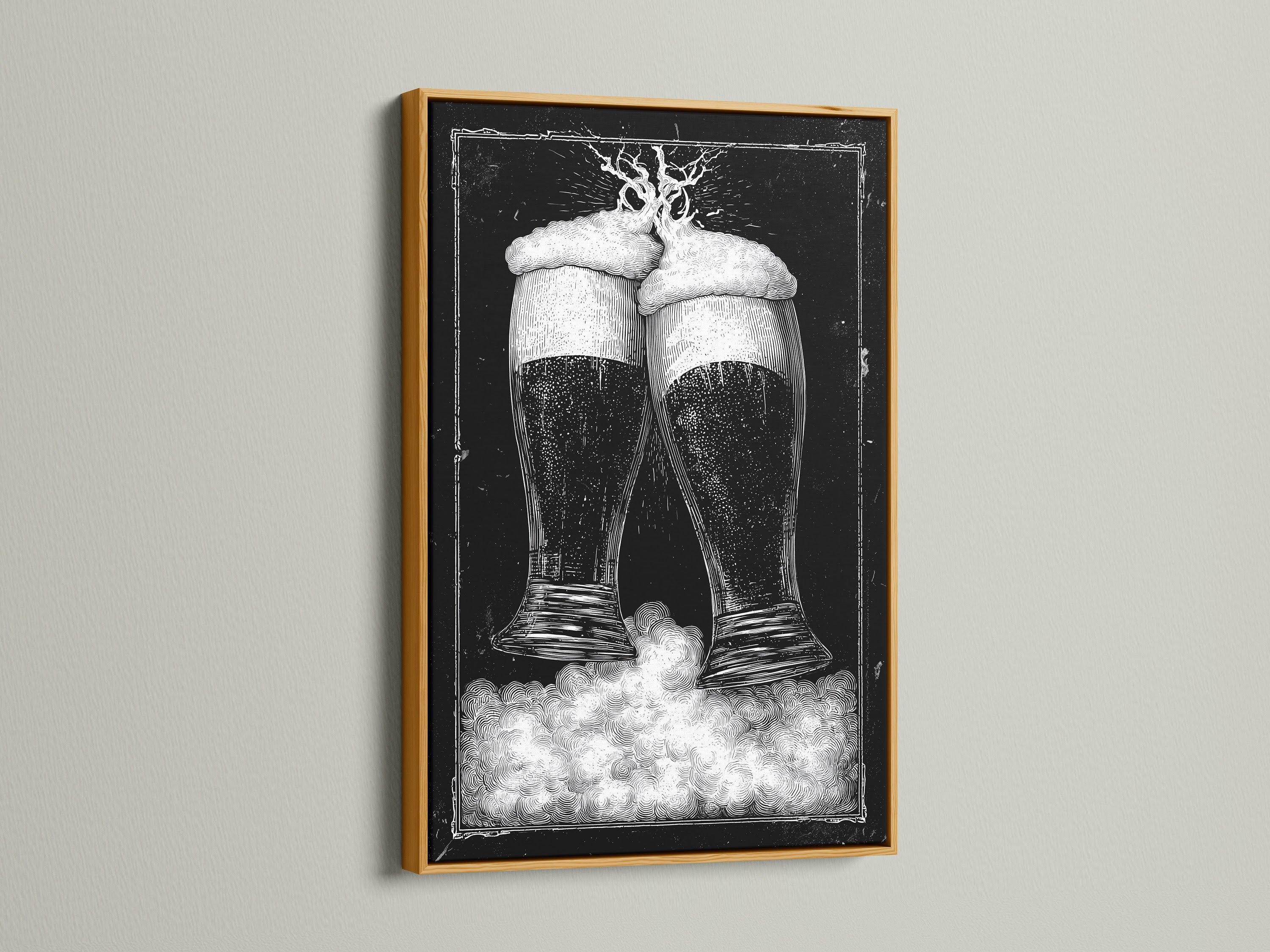 Gold frame artwork. The art features two beer glasses in black and white tones. This piece is mounted on a clean white wall. The frame is a luxurious gold color. Discover framed artwork options to enhance your space. Explore our selection today for the perfect piece.