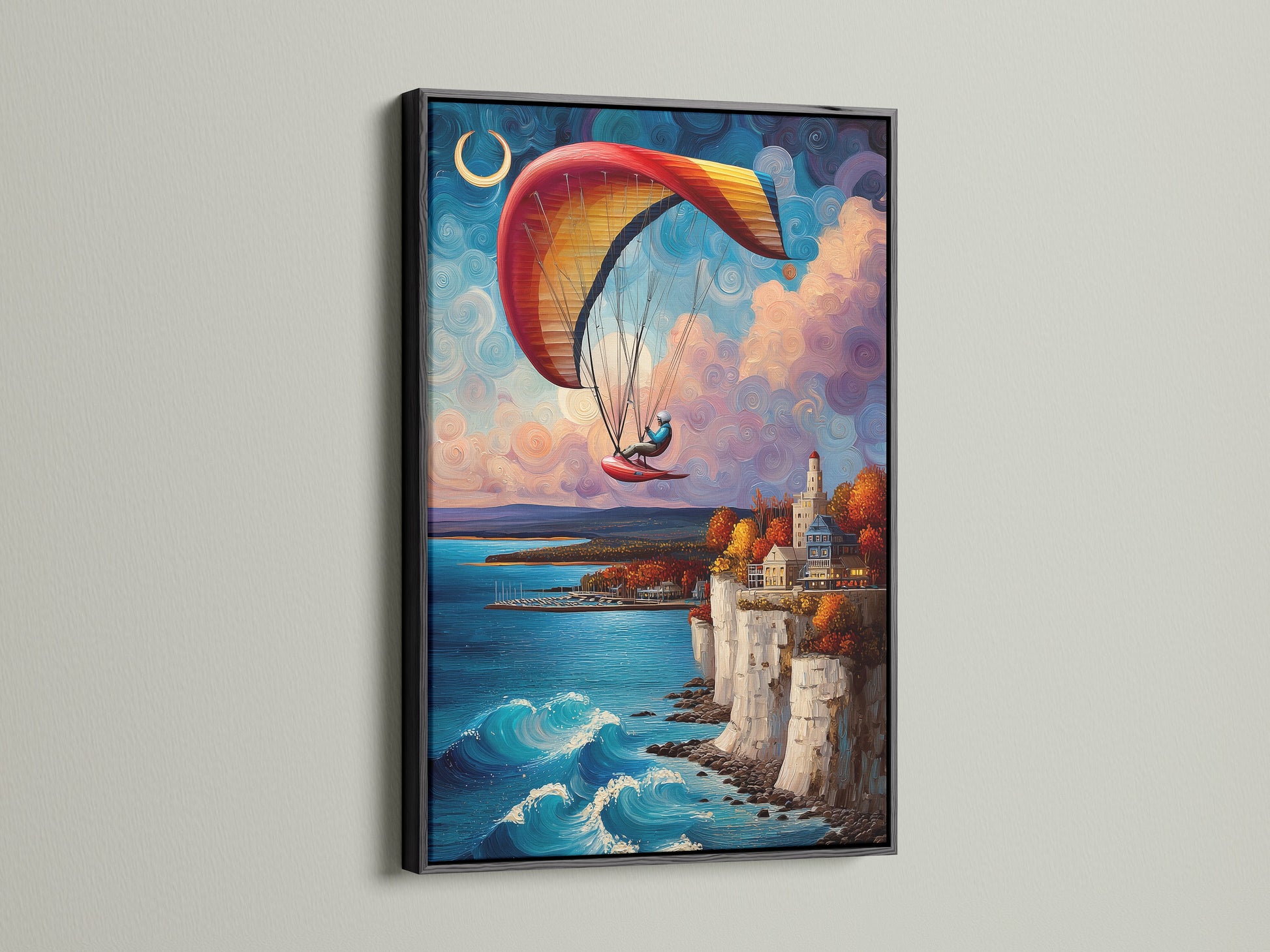 The paragliding artwork is framed in a sleek black frame. The artwork features a coastal landscape with a paraglider in flight. The black frame adds a touch of sophistication. The artwork is perfect for modern interiors. Its blend of blue waters and cliffside art will captivate viewers. This piece brings a sense of adventure to your space.