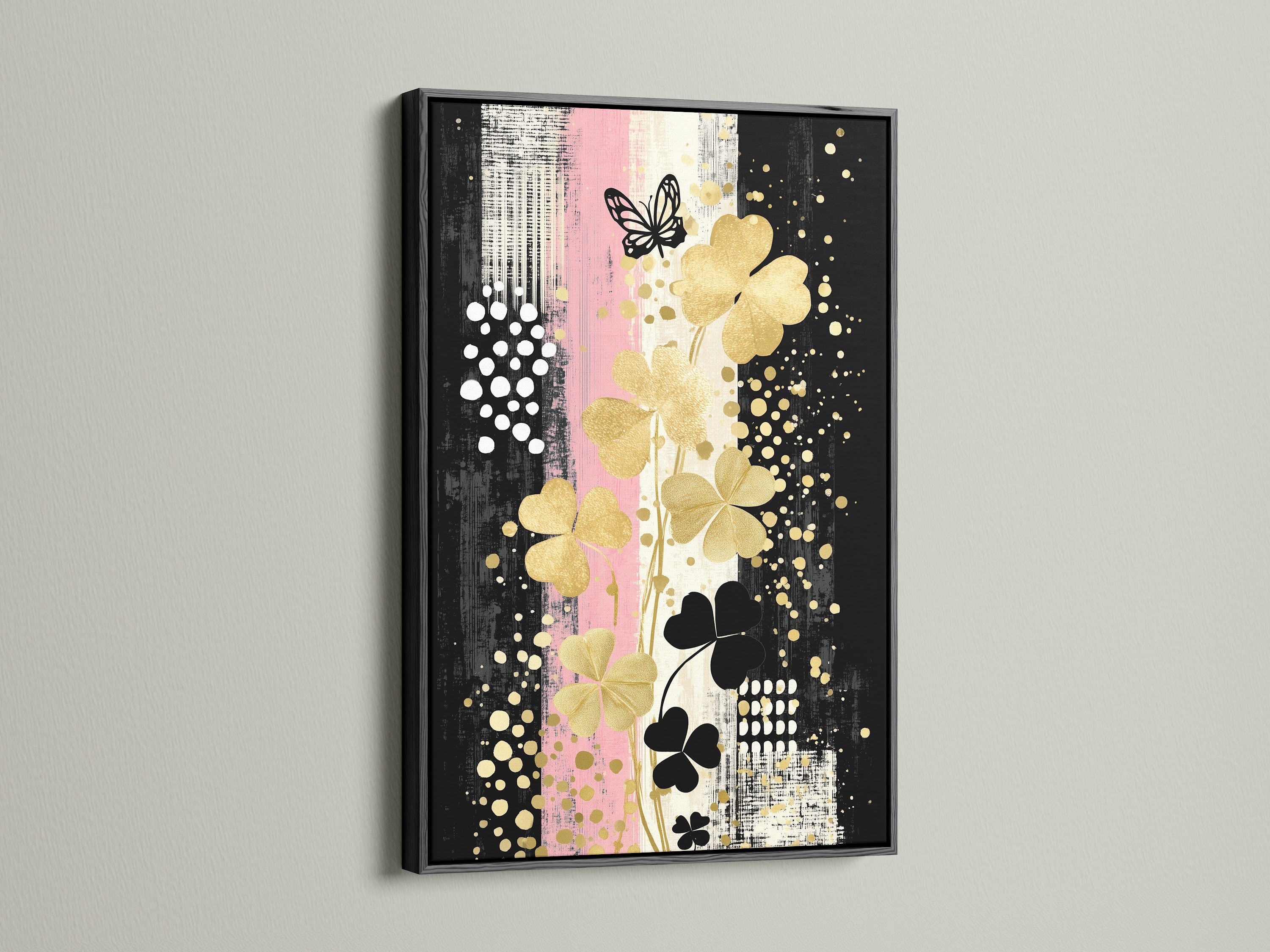 Clover Canvas Print art presented in a black frame. The bold frame complements the gold and black floral artwork. Elevate your space with this contemporary wall decor.