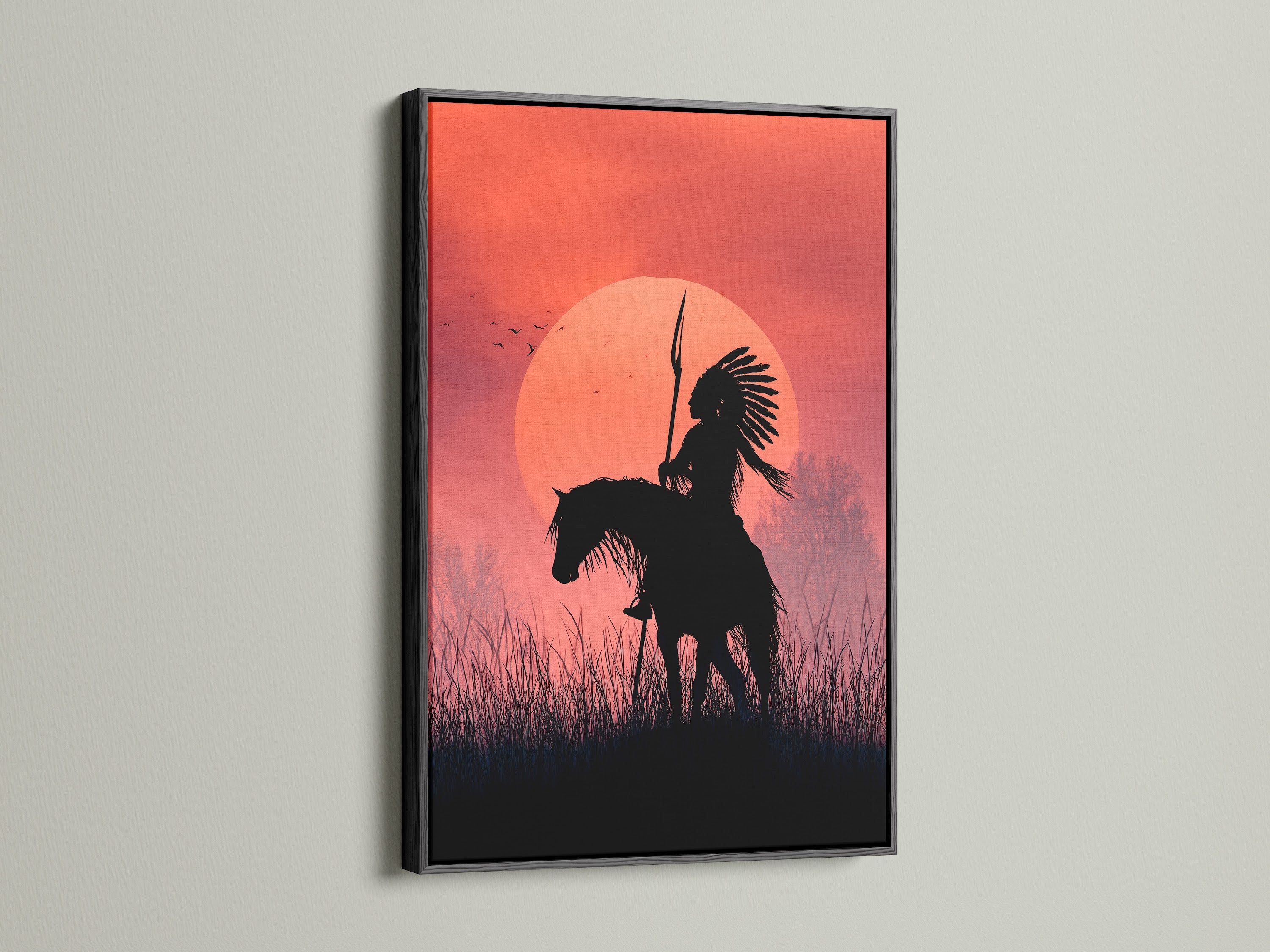 This artwork features an indigenous person on horseback at sunset. It is displayed in a sleek black frame. The black frame adds sophistication to this piece. It makes it a focal point in any room. Buy this framed art today.