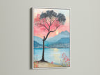 A white frame highlights a beautiful lake sunset canvas print. The mountain view artwork brings a touch of nature indoors. Pink and teal colors create a soothing atmosphere. Ideal as coastal wall art for your home.