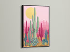 A black frame gives a modern look to this cactus artwork. The art features pink and teal botanical prints. A black frame adds contrast to the desert wall art. Suits modern minimalist or boho aesthetics. Great as office art.