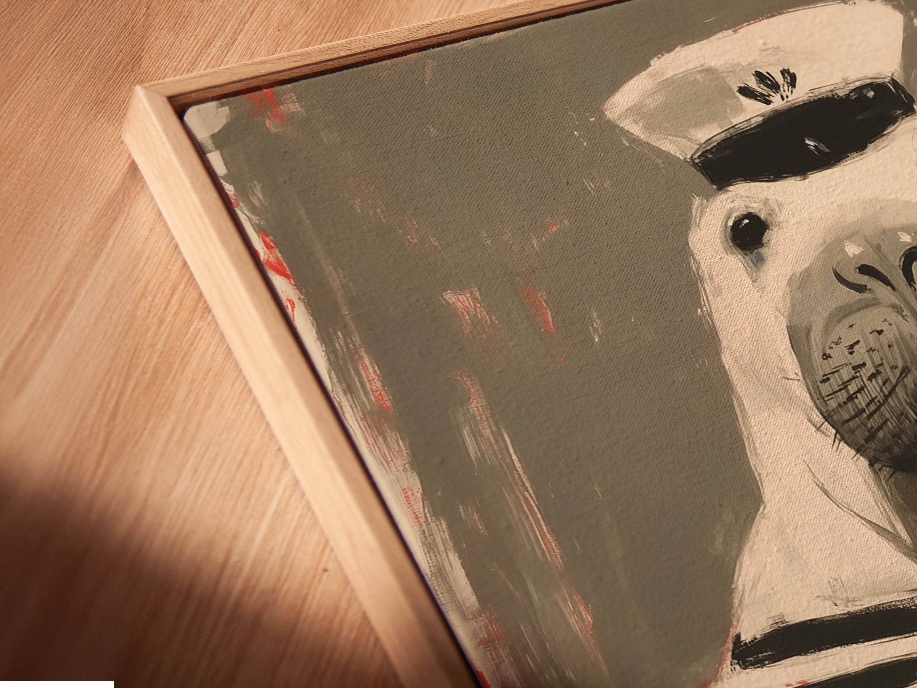 A close-up view shows the canvas print in a floating frame. Notice the depth and dimension this frame provides. The sailor walrus artwork appears to float. This unique framing option enhances any artwork.