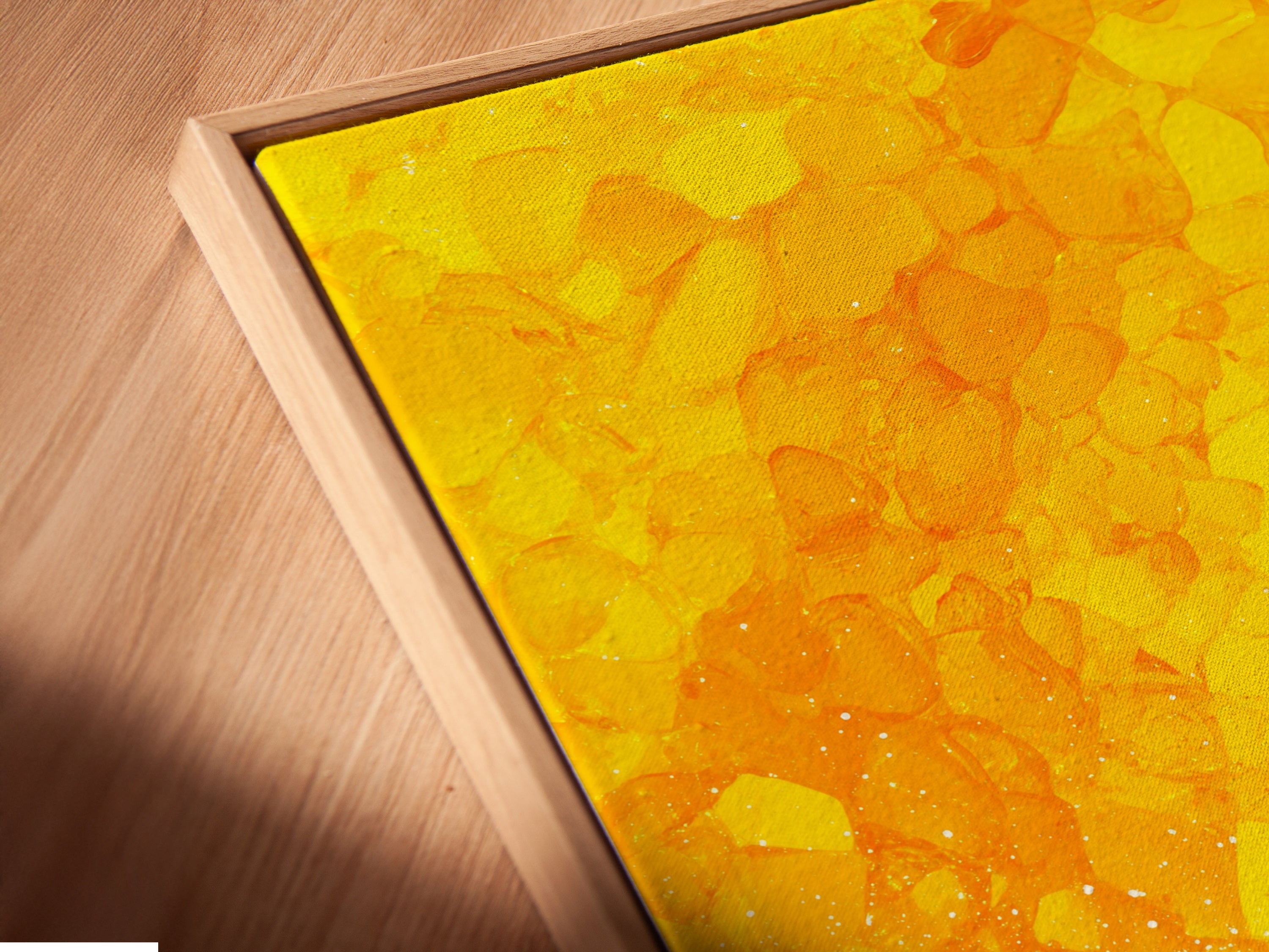 Floating frame detail — canvas texture closeup