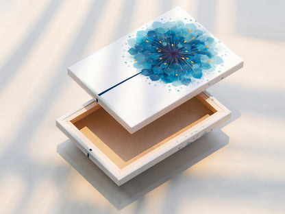 The stretched canvas print displays the blue dandelion artwork vividly. The colors are rich and vibrant. The texture adds depth to the flower artwork. Transform your living space with this botanical wall art.