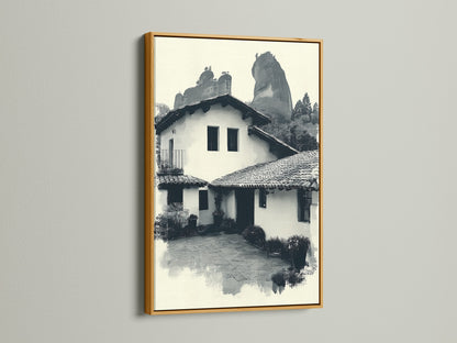 The monochrome Hacienda artwork is presented in a gold frame. This rustic home wall art brings vintage charm. The muted tones provide a classic touch. Enhance your living room with this elegant piece.