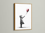 Check out our art prints with a gold frame. A gold frame adds a touch of luxury and sophistication. This frame enhances the artwork with a subtle shimmer. View how a gold frame elevates this Banksy-style art print. Transform your space with a hint of glamour. Perfect for adding a luxurious touch.