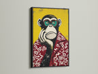 Primate canvas art in a sleek black frame. This pop art print features a funky monkey artwork. It is a great addition to any contemporary art collection. The black frame adds a touch of sophistication. This animal wall decor is perfect for office wall art or study rooms. Bring a playful touch with this quirky wall decor.