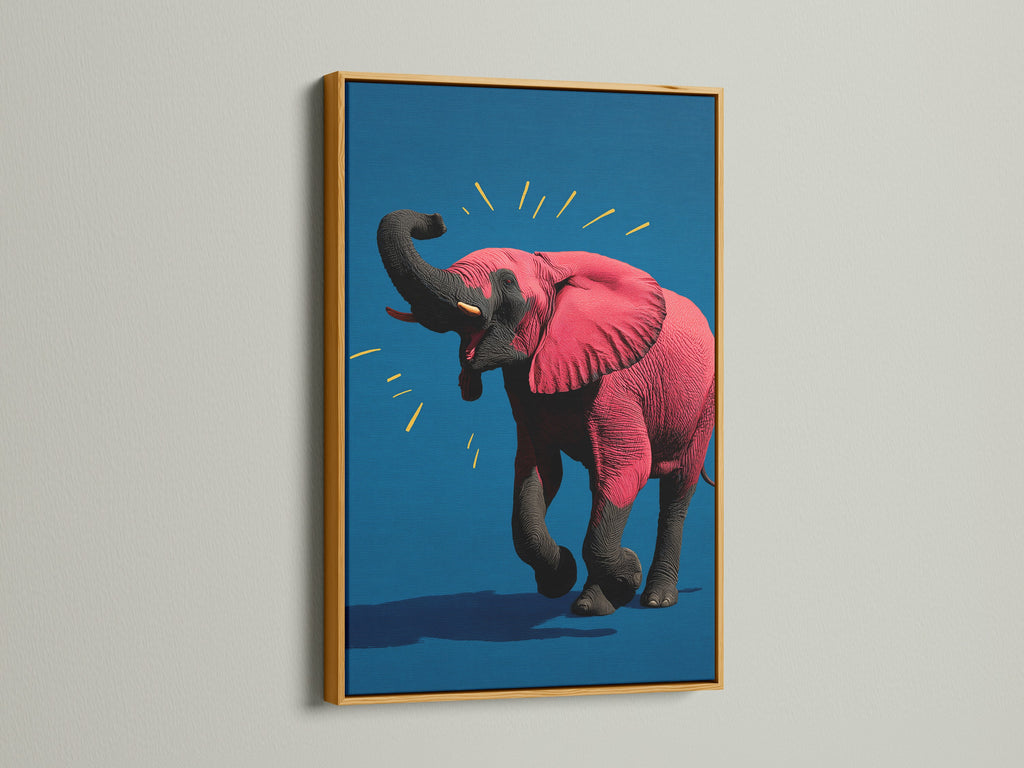 The pink elephant artwork is displayed in a luxurious gold frame. This contemporary animal canvas print brings a touch of elegance to any space. The vibrant pop art is perfect for adding a regal touch to a nursery or office. The gold frame enhances the artwork's vibrant colors.