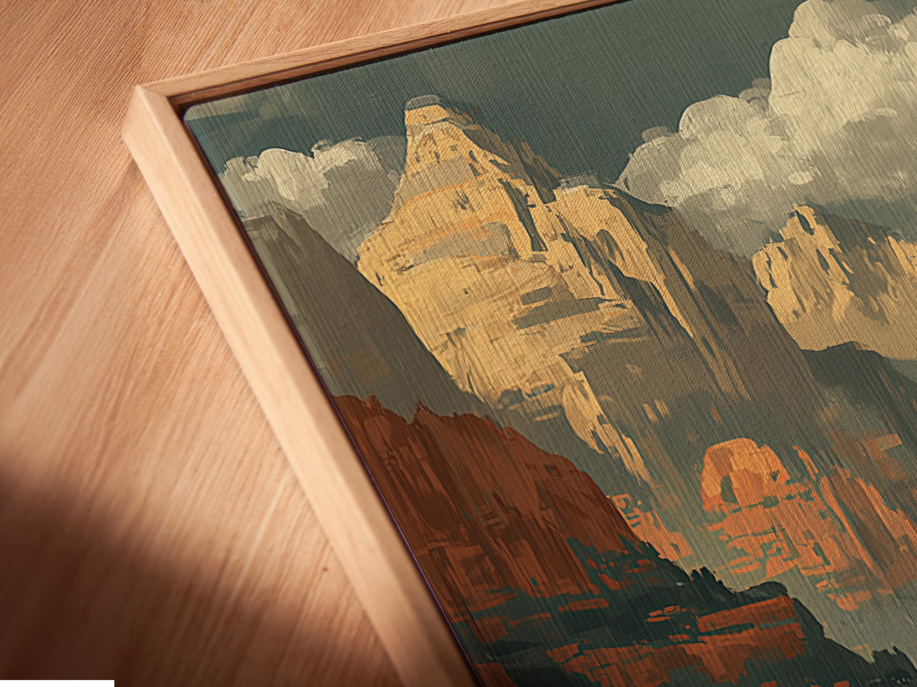A close-up angled view reveals the canvas print with a floating frame. This cycling wall art features a desert canyon landscape. The retro travel poster adds a modern touch to any space. The floating frame gives the artwork a gallery-like appearance. The canvas print captures the texture of the canyon print. Perfect for contemporary interiors.