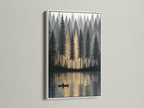 The forest canvas art features a white frame adding a modern touch to nature wall art. The reflection print showcases a canoeing scene in a golden hour glow. It's a peaceful artwork choice for tranquil decor in any room. This lake art print is ideal for minimalist styles.