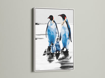Penguin family portrait in a white frame. This animal artwork is a serene addition to nurseries or children's rooms. The blue and white winter wall art brings an antarctic ocean theme indoors.