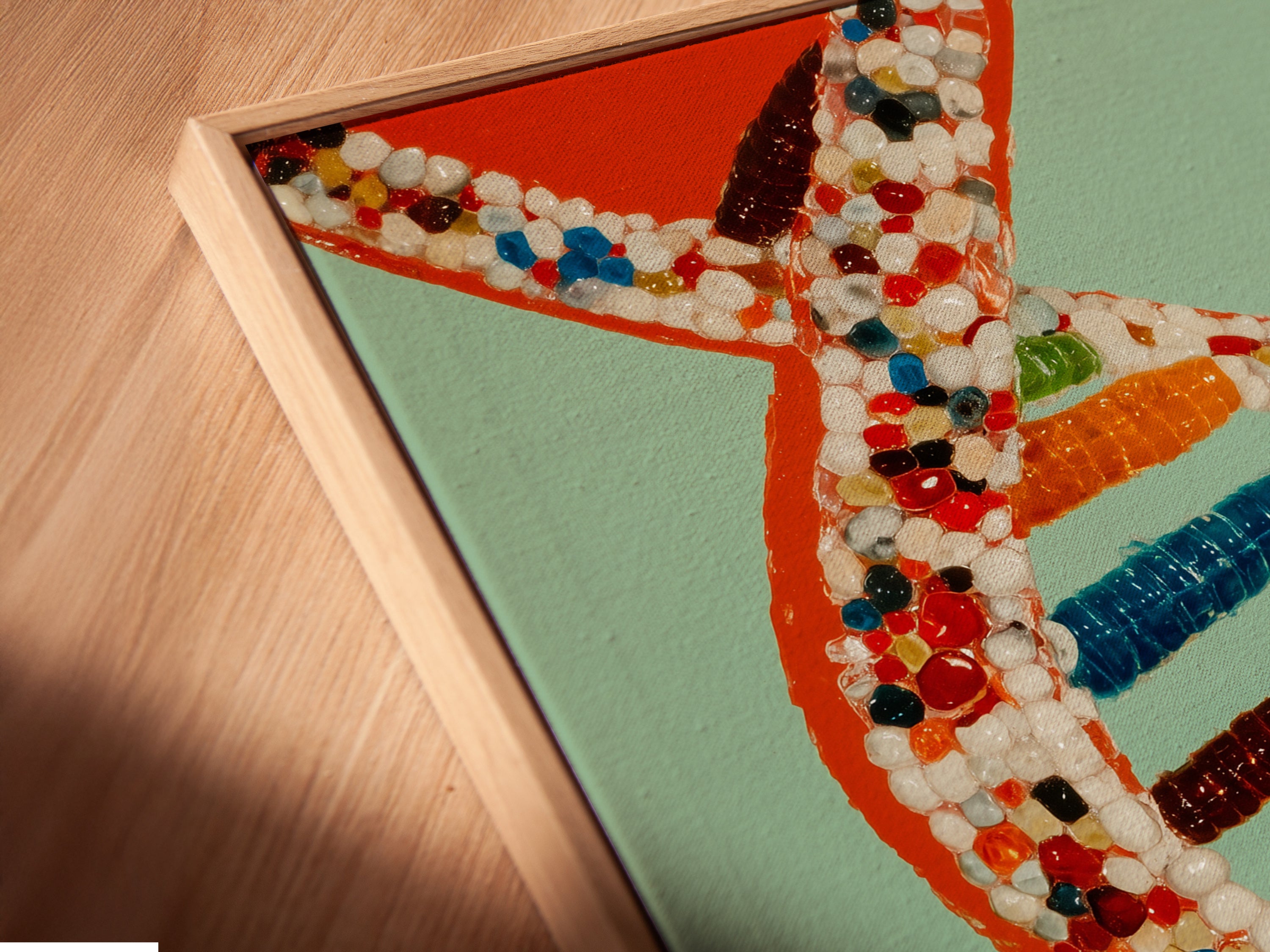 Angled close up of a canvas print in a floating frame. The DNA molecule art makes great science wall art. The colorful chromosome artwork is great for office decor. It is a perfect gift for scientists. The primary color is green