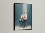 Rustic man with guitar art in a black frame. It enhances any space with vintage wall art. This man with guitar artwork is ideal for music enthusiasts. Elevate your decor today