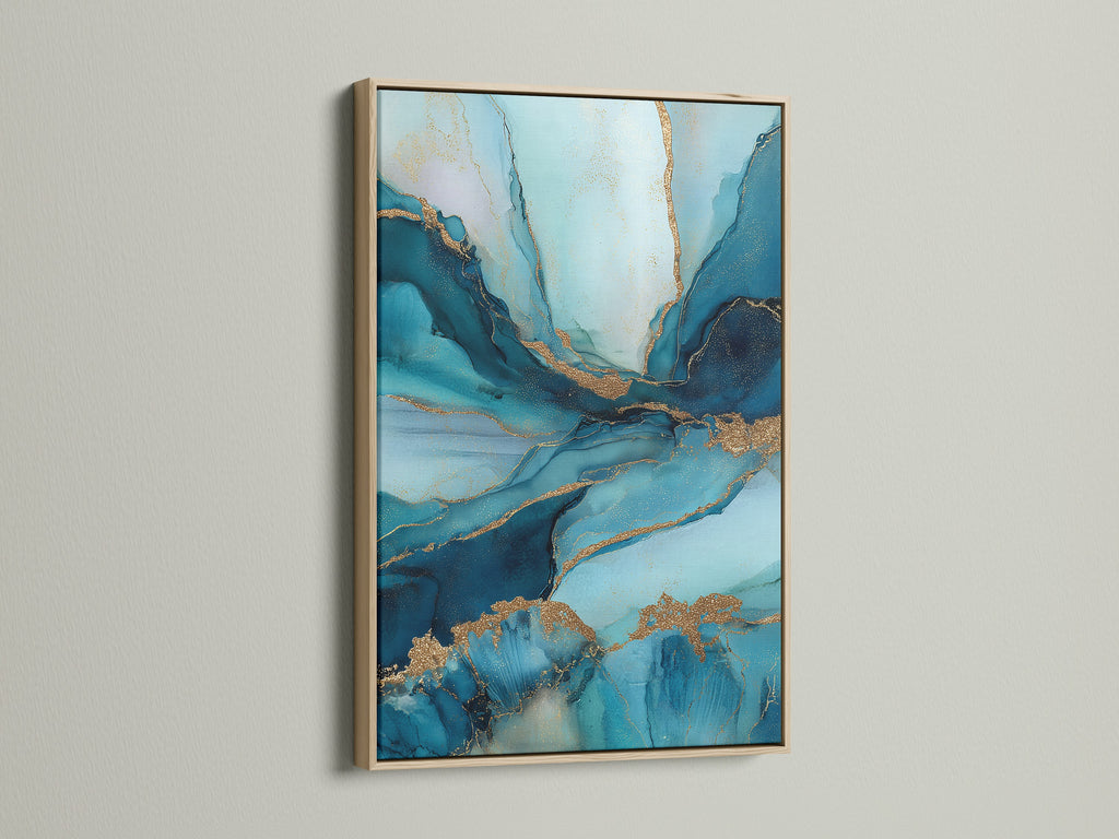 A close-up showcases an abstract blue and gold artwork. It is elegantly framed in a natural oak frame. The fluid teal marble art enhances minimalist interiors. Elevate your living room bedroom or office with this sophisticated piece.