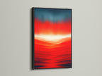 This striking abstract sunset art featuring a red orange mountain landscape is presented in a black frame. The modern canvas print adds sophistication to any space. Warm colors and layered mountains create depth.