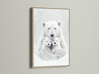 This is a oak frame showcasing a polar bear family artwork. The natural wood tone enhances the monochrome animal canvas. It is ideal for creating a cozy nursery wall decor or bedroom wall decor.