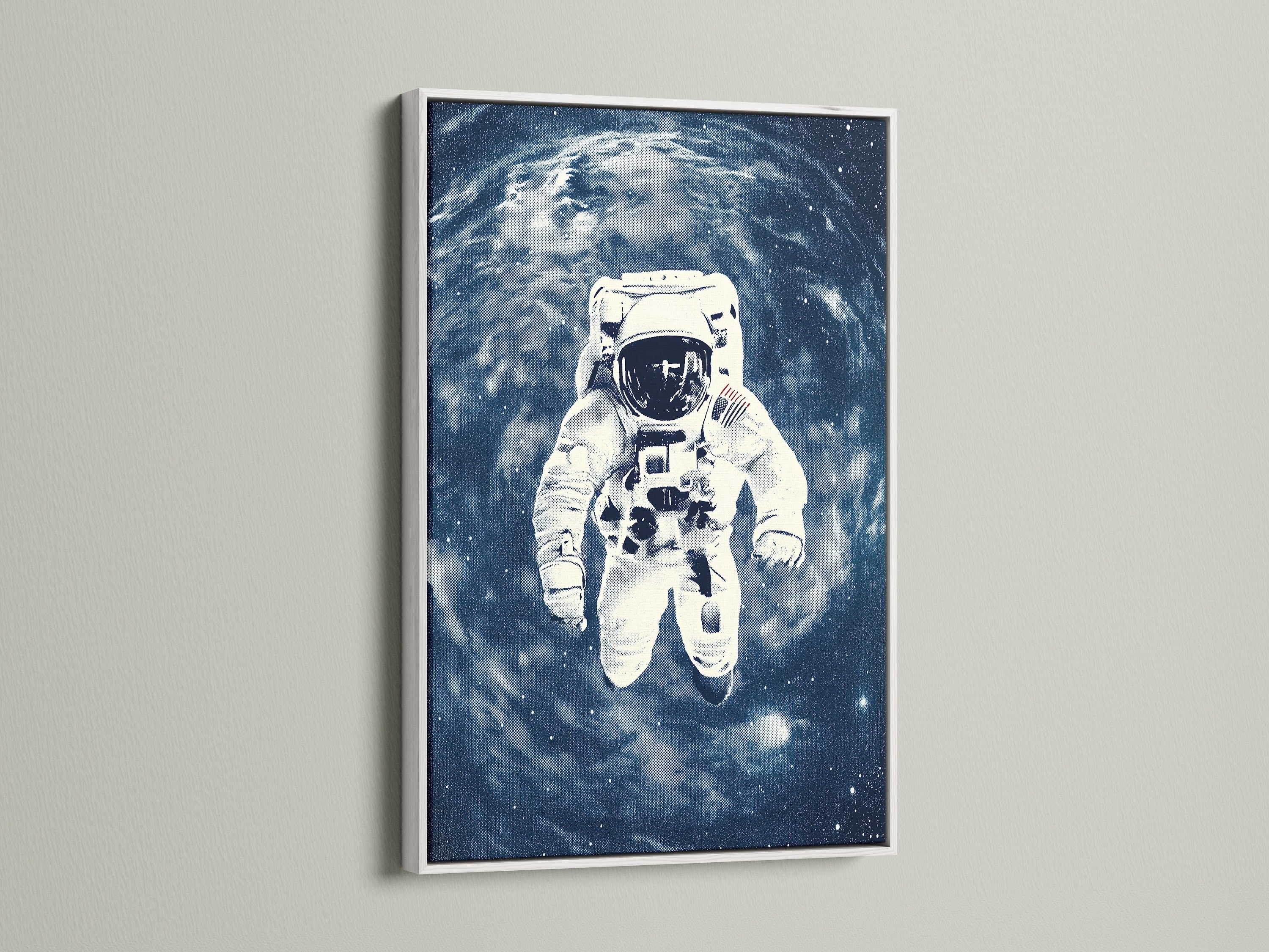 The astronaut space artwork print is beautifully showcased in a white frame. The contrast enhances the blue galaxy wall art. It is perfect for adding a modern touch to offices bedrooms or living rooms. A vintage NASA poster.