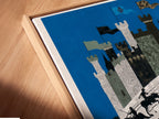 Close-up angled view of the Piano Castle canvas print. It is set in a floating frame. The artwork shows a castle on a piano. Knights are riding across the keys. This unique wall art is perfect for music rooms and art collectors.