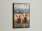 Scottish highland cow canvas in a sleek black frame. This rustic wall art adds a touch of countryside to modern farmhouse interiors. A striking piece for animal and nature art lovers.