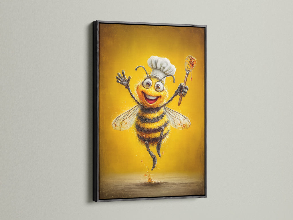 Chef Bee artwork in a black floating frame. This food wall decor adds a touch of whimsy. This bee artwork is a great addition to studios. A contemporary chef wall art piece for your kitchen canvas art collection.