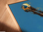 A close up of the Volleyball Player Canvas Print in a floating frame. The artwork appears to float within the frame. A modern and stylish way to display sports artwork. Perfect for bedroom wall decor.