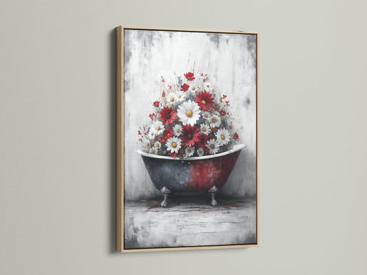 Vintage Bathtub floral Canvas Artwork with an oak frame. The artwork captures a rustic clawfoot tub overflowing with vibrant red and white flowers. Perfect farmhouse wall decor for a spa bathroom. Shop now.