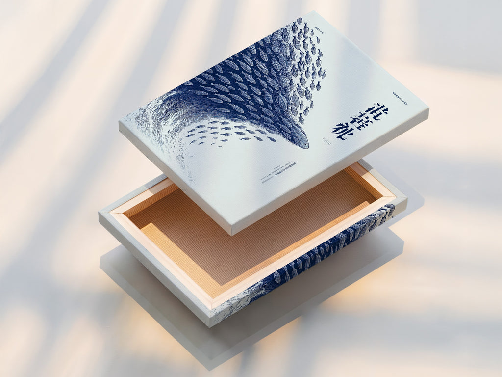 This stretched canvas print displays a mesmerizing fish school art piece. The blue ocean canvas print brings marine life decor to your walls. It is perfect for creating a coastal or tropical ambiance. Transform your living space with aquatic art.