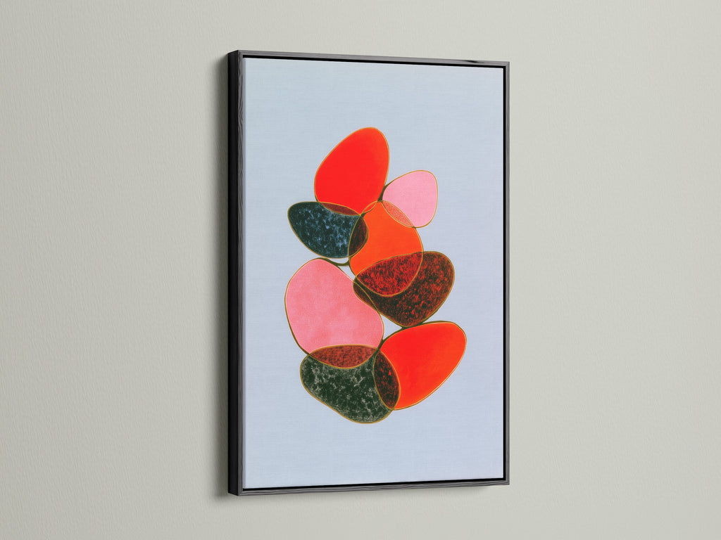 See the abstract stone canvas print with a black frame. The black frame adds a sophisticated touch to the abstract artwork. This geometric print is great for office art. A minimalist art piece.