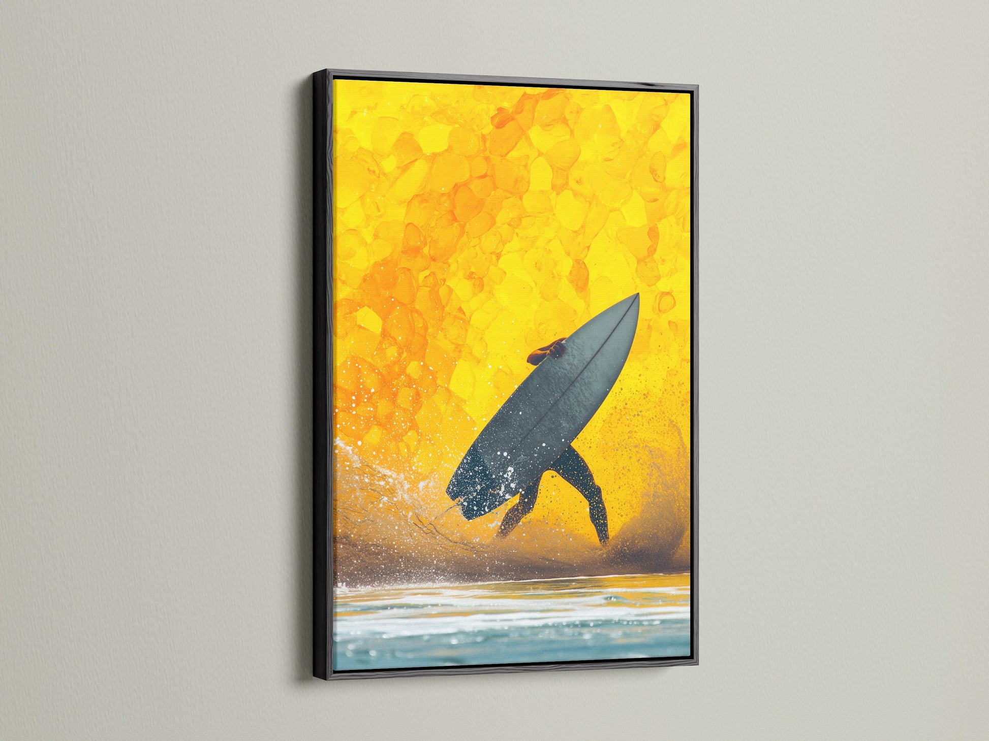 Surfing canvas print in a black frame. The artwork features a surfer silhouetted against a yellow sunset. The black frame adds a modern touch to this coastal decor. Ideal for creating an ocean theme in any room. This sunset art is perfect for beach house art.