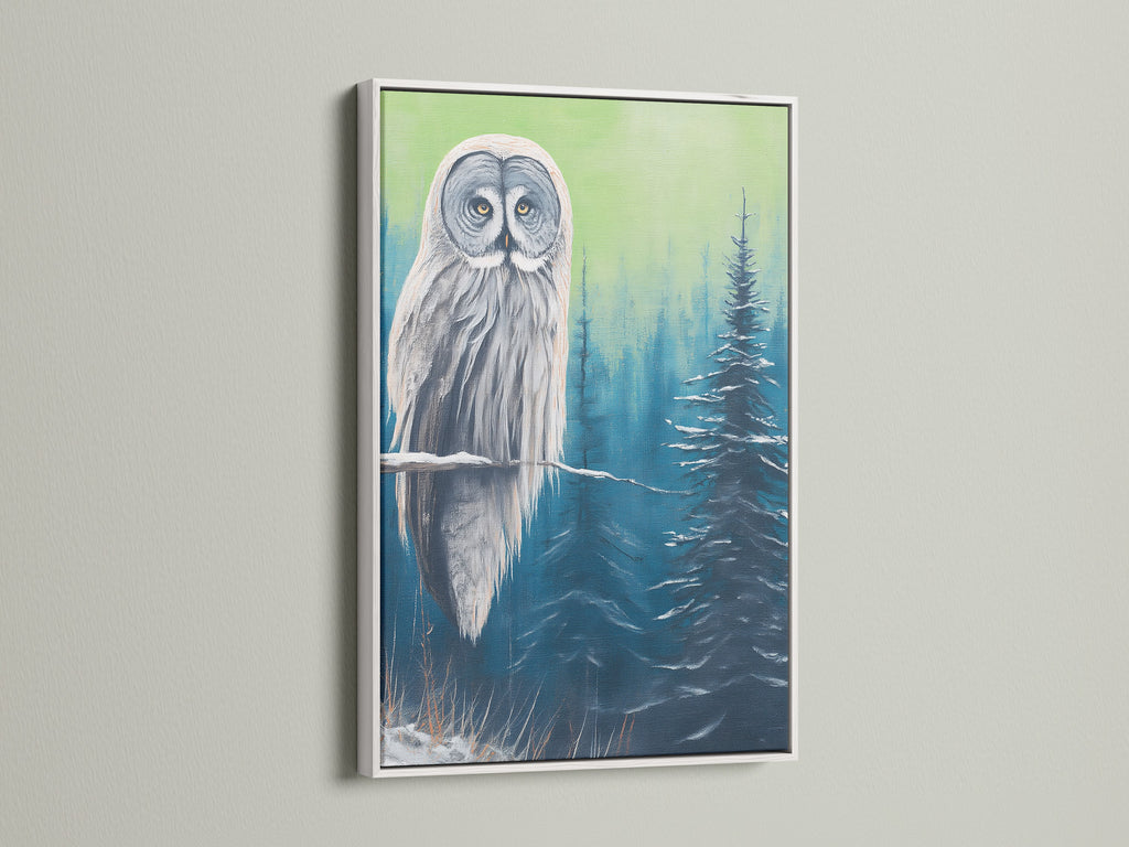 Owl canvas print with a white frame. A serene winter scene featuring a majestic owl. The white frame offers a clean modern look. Ideal for adding a touch of wildlife art to your living room wall.
