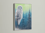 Owl canvas print with a white frame. A serene winter scene featuring a majestic owl. The white frame offers a clean modern look. Ideal for adding a touch of wildlife art to your living room wall.