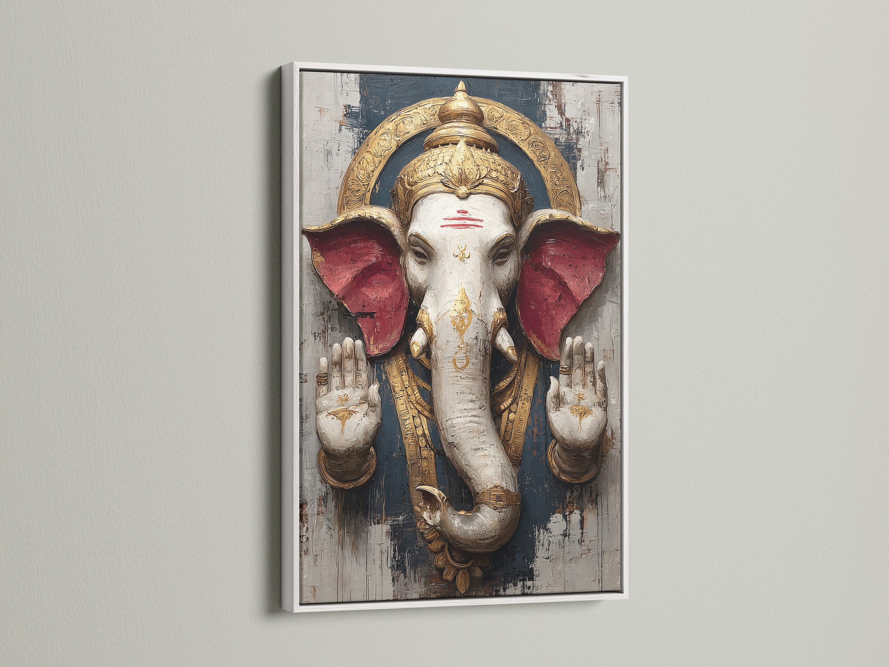 Ganesha Wall Art is beautifully displayed in a white frame. This Hindu Elephant God canvas print offers spiritual wall art. It brings bohemian decor to your meditation room. Enhance your yoga studio with this artwork.