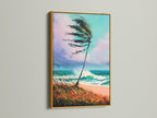 Coastal beach artwork with a gold frame. The artwork showcases a palm tree and a turquoise seascape. This elegant canvas print adds a touch of luxury to your decor. Perfect for coastal themed spaces and modern interiors.