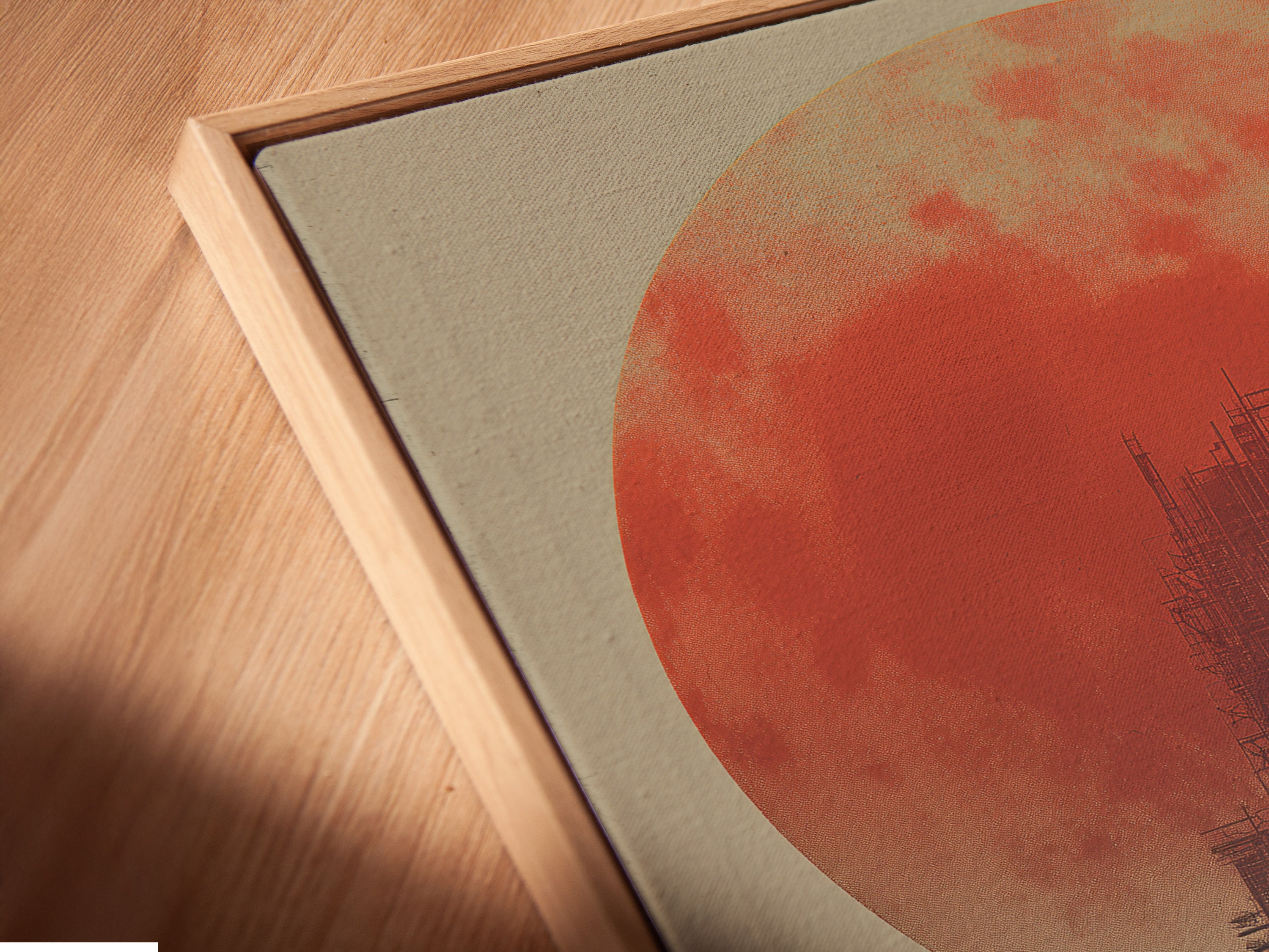 Angled close up shows a canvas print in a floating frame. The floating frame gives a modern touch. The canvas appears to float within the frame. See the detail and craftsmanship up close. Perfect for showcasing canvas art pieces. Add depth and dimension to your artwork.