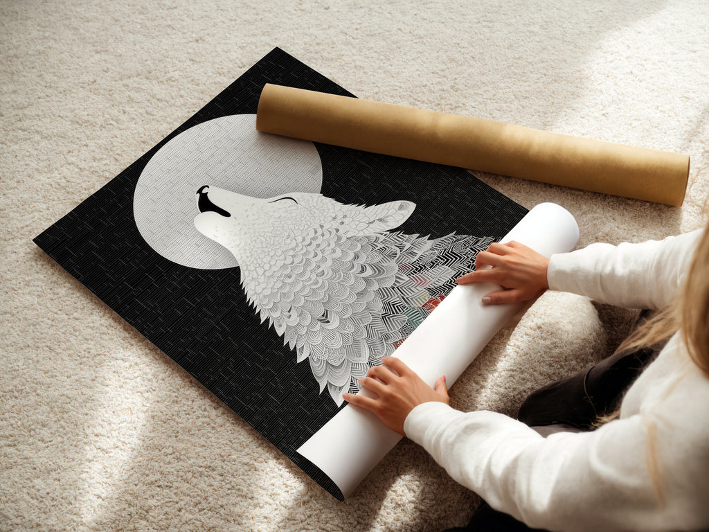 A woman is carefully rolling a fine art poster paper. She is handling the Wolf Howling at Moon print. The black and white artwork is ready to be framed. This abstract animal art will enhance any space. Perfect for modern or minimalist decor. Bring nature into your home.