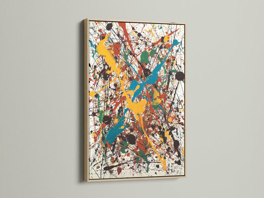 This image showcases an abstract painting in an oak frame. The frame enhances the artwork's visual appeal. The artwork features splatters of yellow teal red green and black paint. Find the perfect oak frame for your art.
