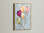 Floral watercolor canvas print in a gold frame is displayed. The blush pink decor complements modern interiors. This botanical canvas is suitable for a stylish office. Ideal for adding a touch of elegance with flower artwork. Makes a thoughtful flower gift idea.