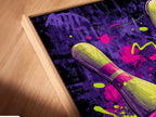 A close-up angle shows a canvas print in a floating frame. This neon purple sports wall art features a striking bowling scene. The retro bowling alley canvas print is perfect for game room decor. The floating frame gives the artwork a modern sophisticated look.