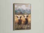 Highland cow art displayed in an oak frame. This farm animal print brings rustic elegance to your home decor. Perfect for a country-themed living room or bedroom wall.