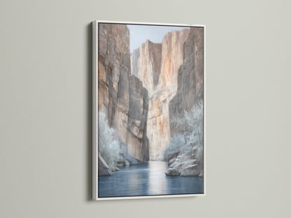 Canyon River canvas print with a sleek white frame. This neutral wall art features a stunning desert landscape. The white frame enhances the artwork's natural tones. Perfect as office art or living room decor. This nature painting brings a touch of the Southwest to your home. Explore this scenic canvas today.