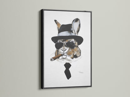 Gentleman Rabbit art in a black frame. A sophisticated choice for office wall art. The black frame adds contrast and elegance. It is a dapper animal print that stands out. Ideal for urban and eclectic styles. The artwork is a unique statement piece.