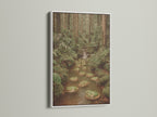 Botanical art print of a frog pond in a white frame. This enchanted forest artwork creates a fairy tale atmosphere. This piece enhances cottagecore and eclectic styles for bedroom or living room wall decor.